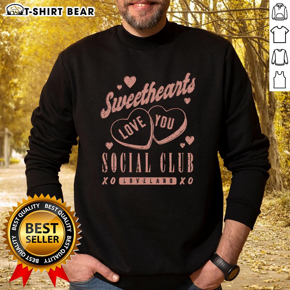 Alt Text: Pretty Sweethearts Social Club Love Land XOXO sweatshirt featuring a stylish design and cozy fit for casual wear.