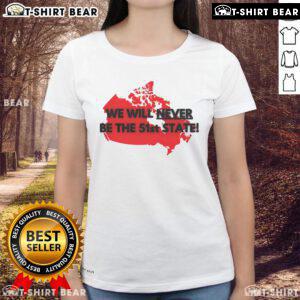 Top Canada Will Never Be The 51st State Ladies Tee showcasing a stylish graphic tee with a bold slogan on a casual backdrop.
