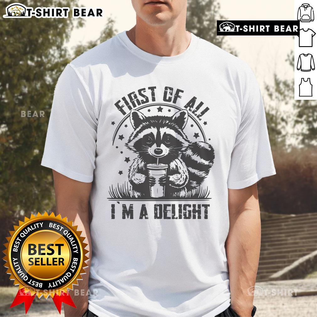 Funny raccoon t-shirt with the phrase 'Top First Of All I'M A Delight' showcasing a playful raccoon design.