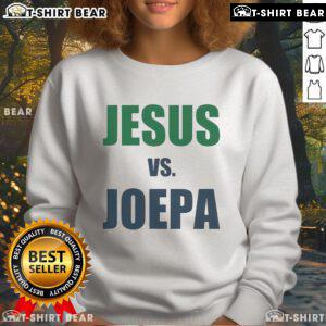 Top Jesus vs Joepa Sweatshirt featuring a bold graphic design, perfect for fans of spirited apparel and unique fashion.