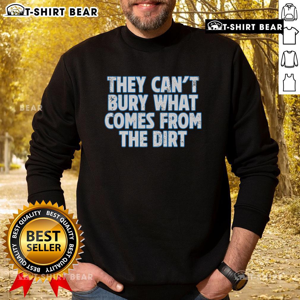 Top Lions sweatshirt featuring 'They Can't Bury What Comes From The Dirt' graphic, perfect for casual wear and lion enthusiasts.
