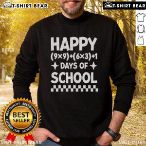 Happy math teacher wearing '100 Days of School' sweatshirt, celebrating the 100th day with fun equations and joy.