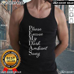 Stylish dark ambient swag featuring a 'Please Excuse My Dark Ambient Swag' Coil tank top on a model in a trendy setting.