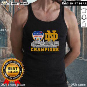 Notre Dame Fighting Irish tank top celebrating 2024-25 Capital One Orange Bowl champions against a city skyline backdrop.