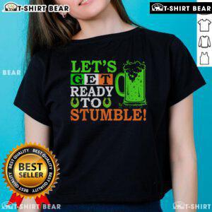 Top St. Patrick's Day Ladies Tee 'Let's Get Ready to Stumble' featuring vibrant beer graphic and festive green design.