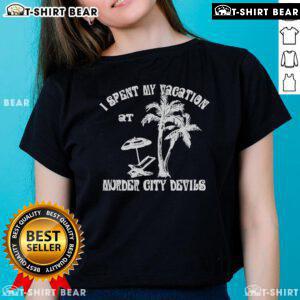 Top The Murder City Devils I Spent My Vacation Ladies Tee featuring bold graphic design and vibrant colors.