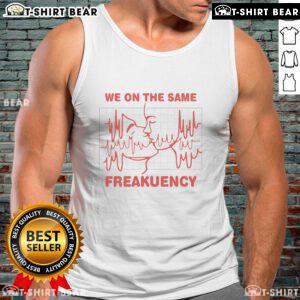 Model wearing Top We On The Same Freakuency Kissing Tank Top, showcasing a stylish design perfect for casual outfits.