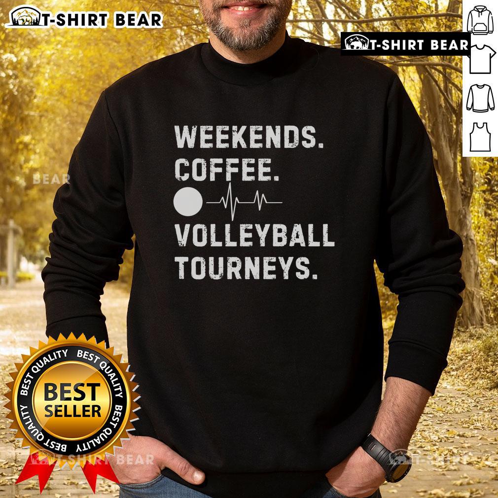 Cozy Top Weekend Coffee and Volleyball sweatshirt displayed on a wooden table with a coffee cup and volleyball in the background.