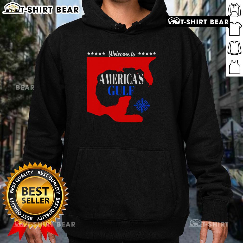 Cozy 'Welcome to America's Gulf' hoodie displayed on a hanger, perfect for beach lovers and travelers.