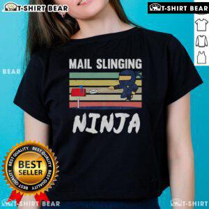 Funny mail-slinging ninja mailman graphic on a retro ladies tee, perfect for postman fans and quirky apparel lovers.