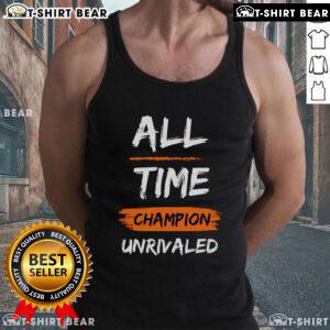 Model wearing a Good-All-Time-Champion-Unrivaled-Tank-Top in a vibrant outdoor setting, showcasing its stylish design.