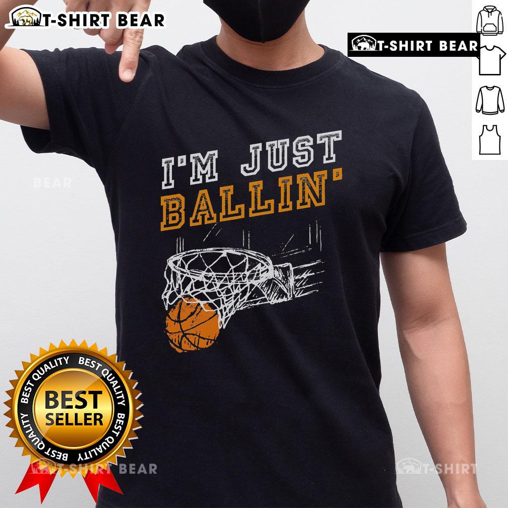 Alt Text: Basketball player wearing 'Nice I'M Just Ballin' T-shirt, showcasing sporty style and passion for the game.