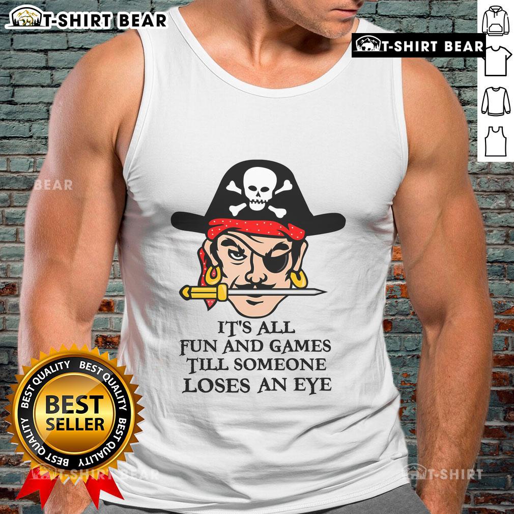 Original 'It's All Fun and Games Till Someone Loses an Eye' tank top design featuring playful text in bold colors.