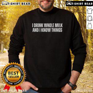 Cozy sweatshirt featuring 'I Drink Whole Milk And I Know Things' slogan, perfect for dairy lovers and casual wear.