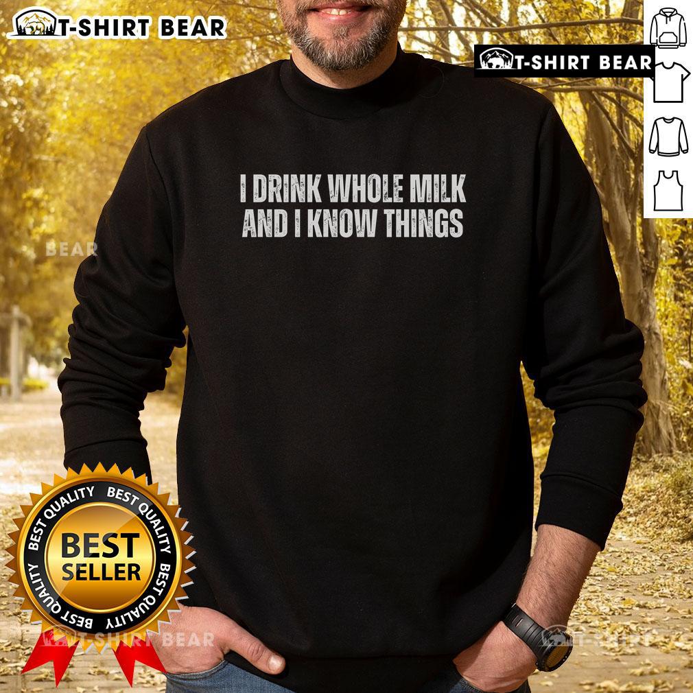 Cozy sweatshirt featuring 'I Drink Whole Milk And I Know Things' slogan, perfect for dairy lovers and casual wear.
