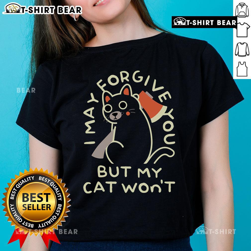 Top I May Forgive You But My Cat Won't Ladies Tee featuring a humorous cat graphic and playful text design.
