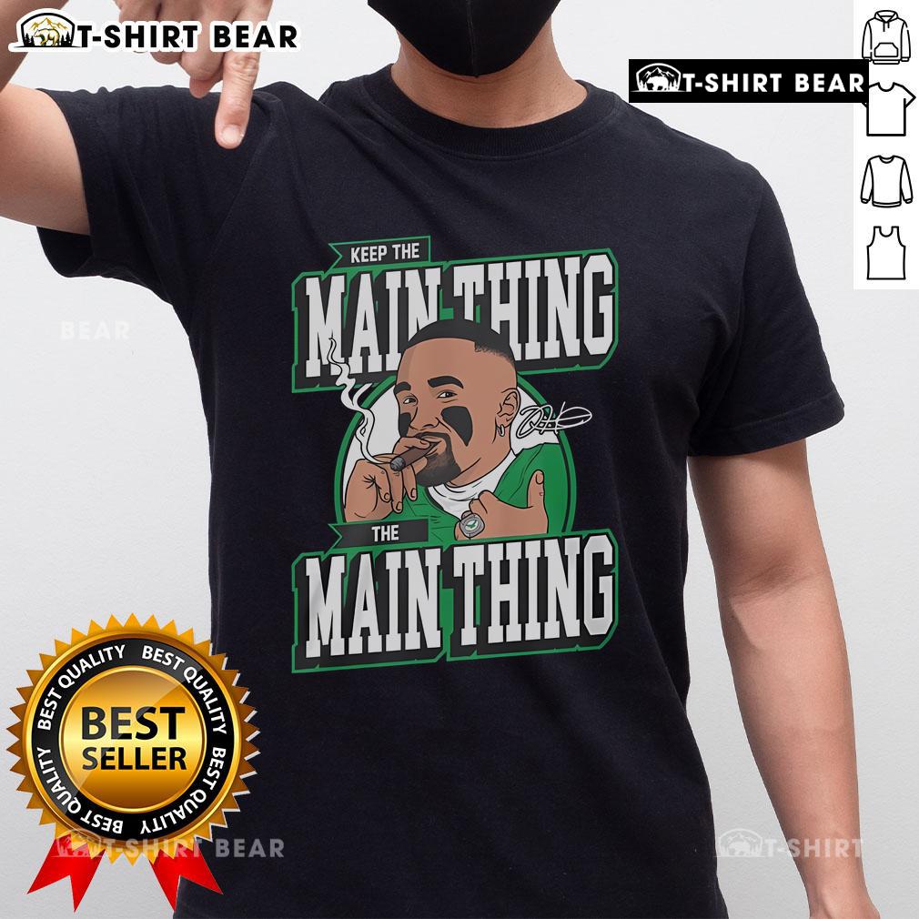 Alt Text: Top Jalen Hurts 'Keep The Main Thing The Main Thing' T-Shirt design featuring bold typography and vibrant colors.