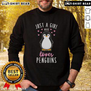 Cozy Top Just A Girl Who Loves Penguins Sweatshirt with playful penguin graphic, perfect for casual winter wear.