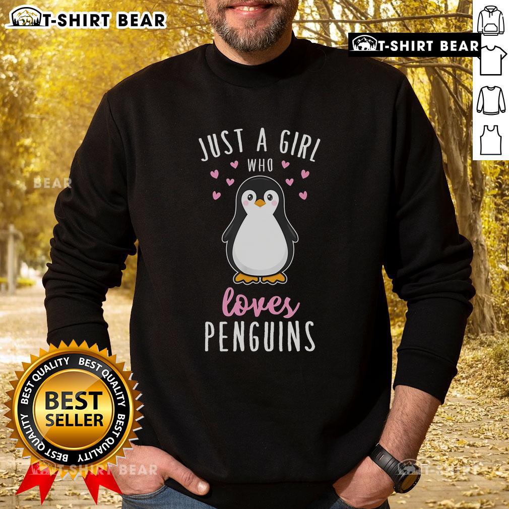 Cozy Top Just A Girl Who Loves Penguins Sweatshirt with playful penguin graphic, perfect for casual winter wear.