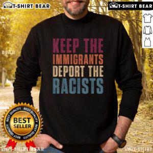 Pro-immigration retro sweatshirt featuring 'Top Keep The Immigrants, Deport The Racists' slogan in bold lettering.