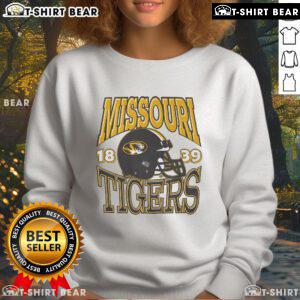 Alt Text: Stylish Top Missouri Tigers Classic Team Helmet Sweatshirt featuring bold team colors and logo for fans.