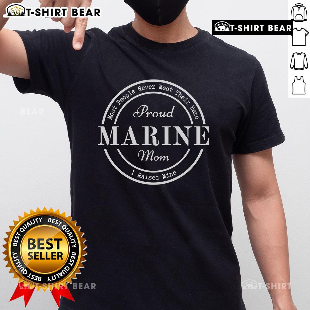 Marine Mom T-Shirt featuring 'Top Most People Never Meet Their Hero, I Raised Mine' inspiring design.