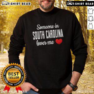 Cozy South Carolina sweatshirt with 'Someone Loves Me' design, perfect for showing state pride and warmth.