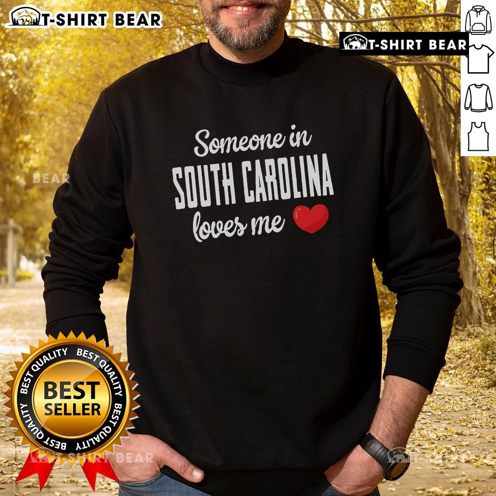 Cozy South Carolina sweatshirt with 'Someone Loves Me' design, perfect for showing state pride and warmth.