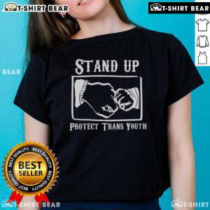 Alt Text: Top Stand Up Protect Trans Youth Ladies Tee featuring bold graphic design promoting trans rights and support.