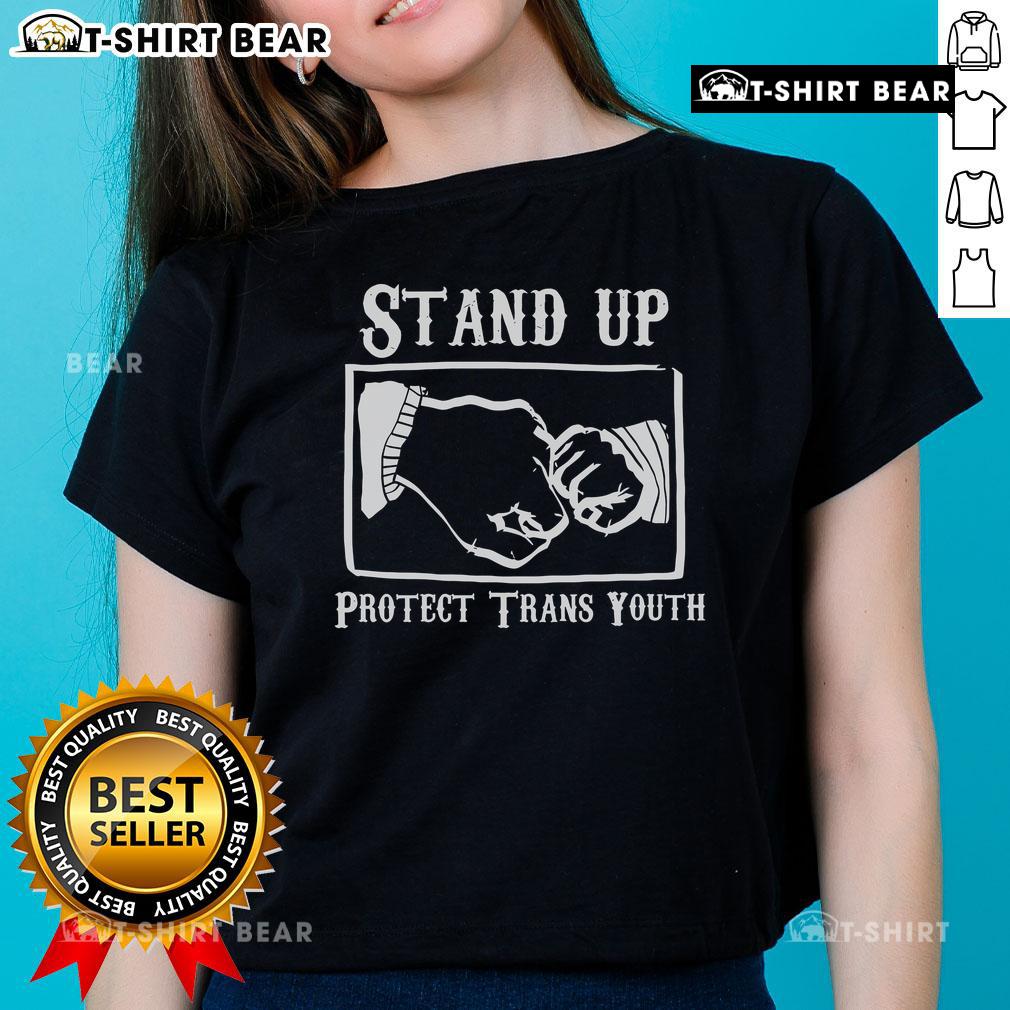 Alt Text: Top Stand Up Protect Trans Youth Ladies Tee featuring bold graphic design promoting trans rights and support.