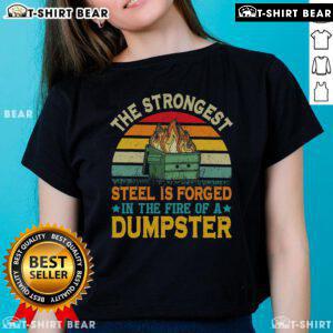 Top ladies tee featuring 'The Strongest Steel Is Forged In The Fire Of A Dumpster' graphic design for bold fashion statements.