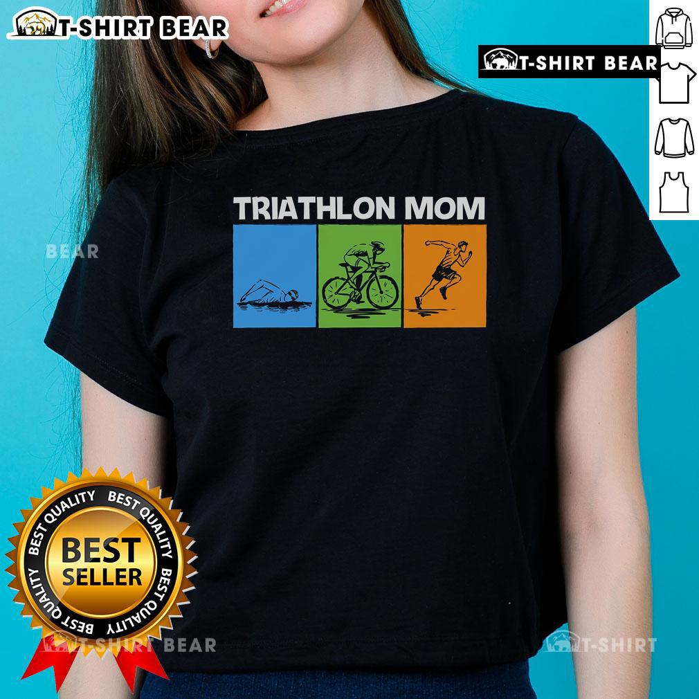 Top Triathlon Mom art on a ladies tee, celebrating female triathletes and their dedication to the sport.