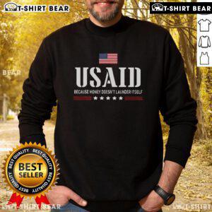 US Americans sweatshirt featuring the phrase 'Money Doesn't Launder Itself' with a stylish design for social awareness.