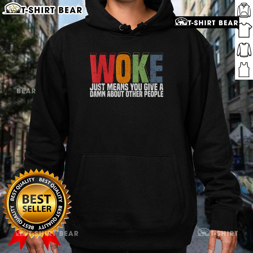 Alt Text: Top Woke hoodie featuring 'Just Means You Care About Others' text, perfect for social justice advocates.