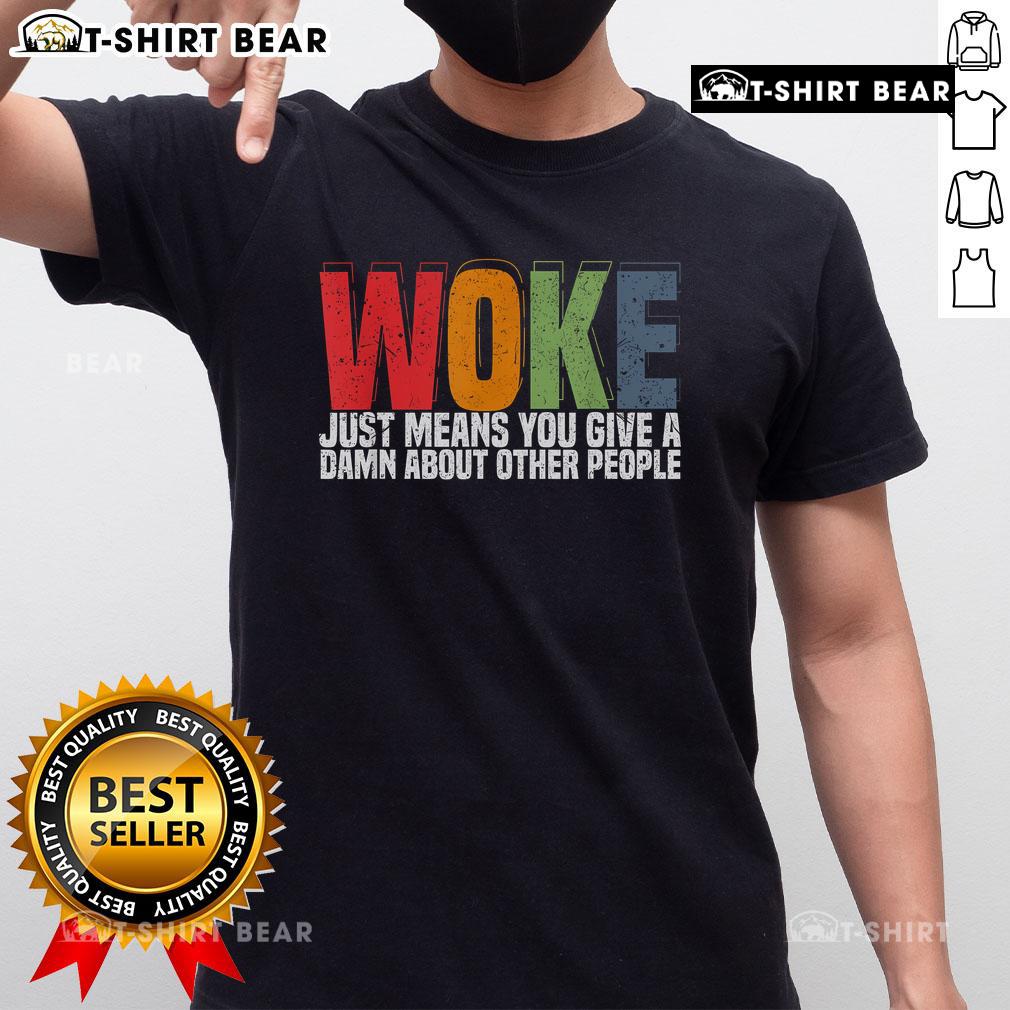 Top Woke Just Means You Give A Damn About Other People T-Shirt in vibrant colors, promoting social awareness and compassion.