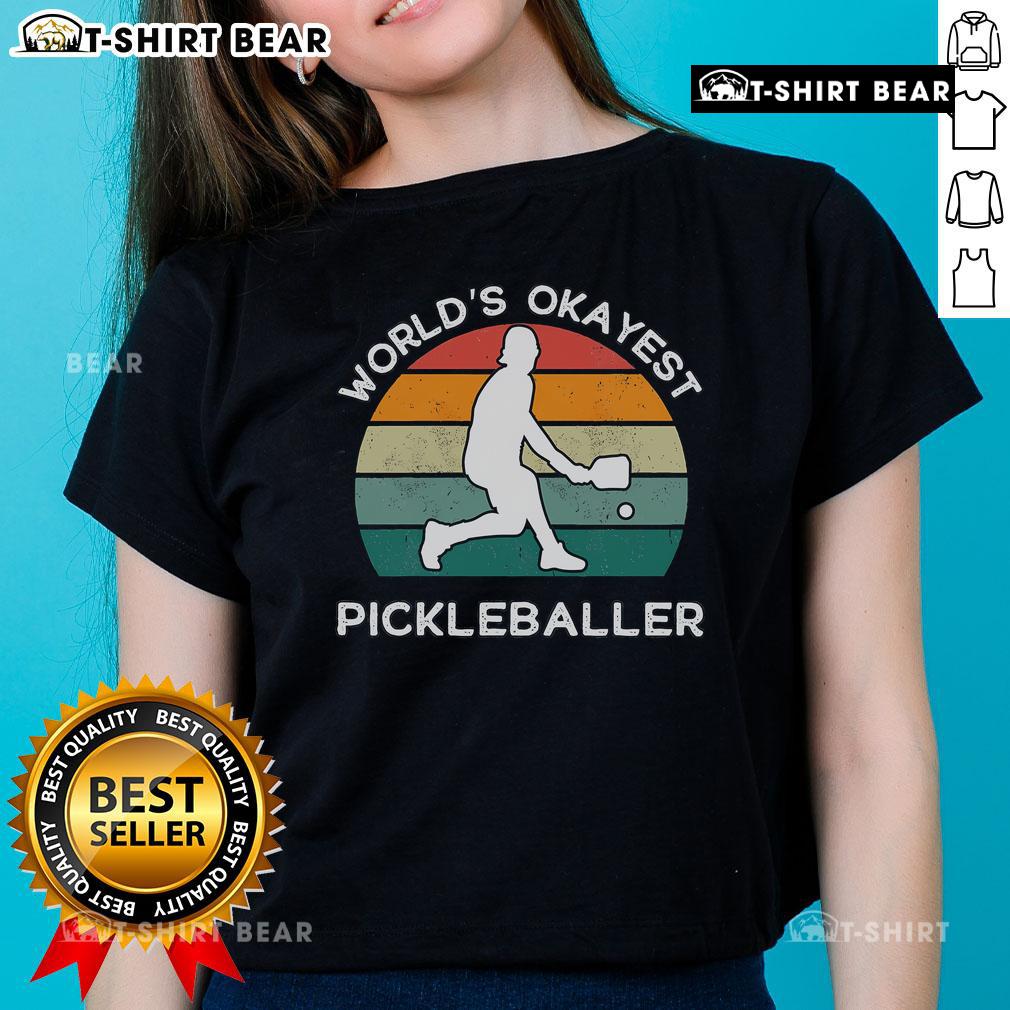 Funny retro pickleball player tee for ladies featuring 'Top World's Okayest Pickleballer' design.