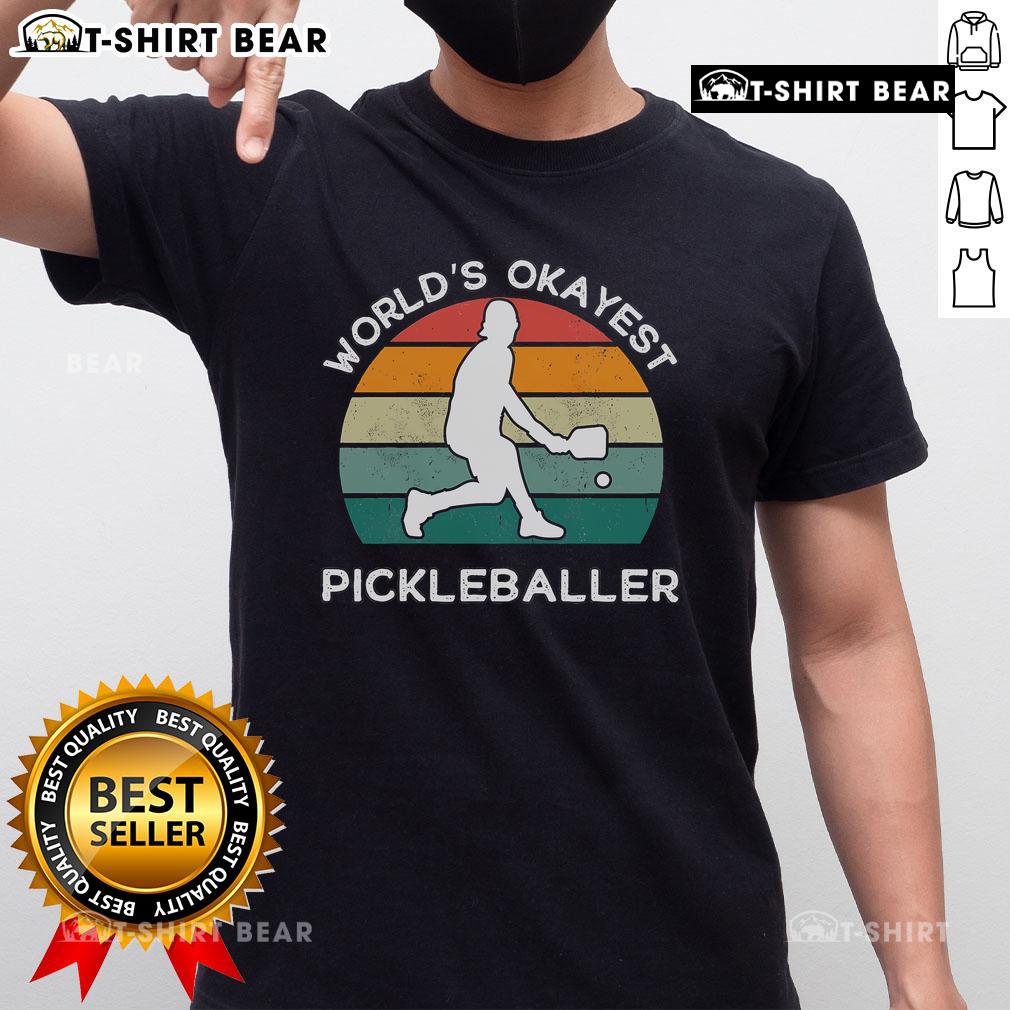 Top World's Okayest Pickleballer T-shirt featuring a retro design for humorous pickleball enthusiasts.