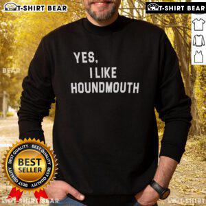 Cozy 'Yes I Like Houndmouth' sweatshirt displayed on a wooden background, perfect for fans of the band Houndmouth.