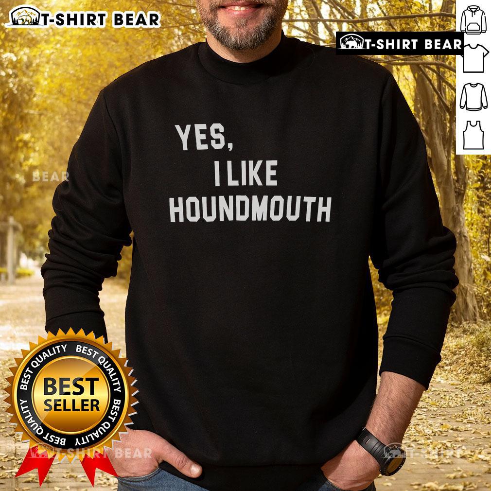 Cozy 'Yes I Like Houndmouth' sweatshirt displayed on a wooden background, perfect for fans of the band Houndmouth.
