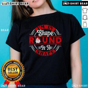 Funny cat graphic on a ladies tee with the phrase 'I'm in shape, round is a shape.' Perfect for cat lovers!