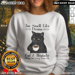 Black cat coffee sweatshirt featuring the phrase 'You Smell Like Drama And A Headache' for cozy, quirky style.
