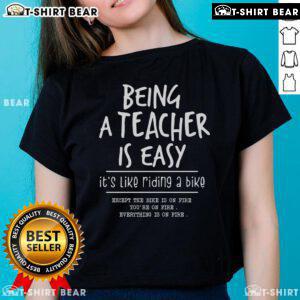 Official Being A Teacher Is Easy Like Riding A Bike Ladies Tee featuring a fun graphic design for educators.