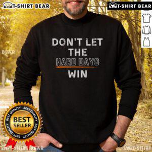 Premium 'Don't Let The Hard Days Win' Sweatshirt in cozy fabric, perfect for motivational style and comfort.