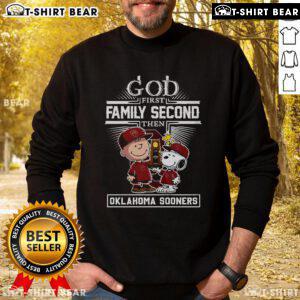 Premium God First Family Second Oklahoma Sooners Snoopy Sweatshirt featuring a stylish design for fans and comfort lovers.