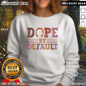 Top Black Woman wearing Dope By Default Afro Black History Retro Sweatshirt, showcasing pride and style in vibrant colors.