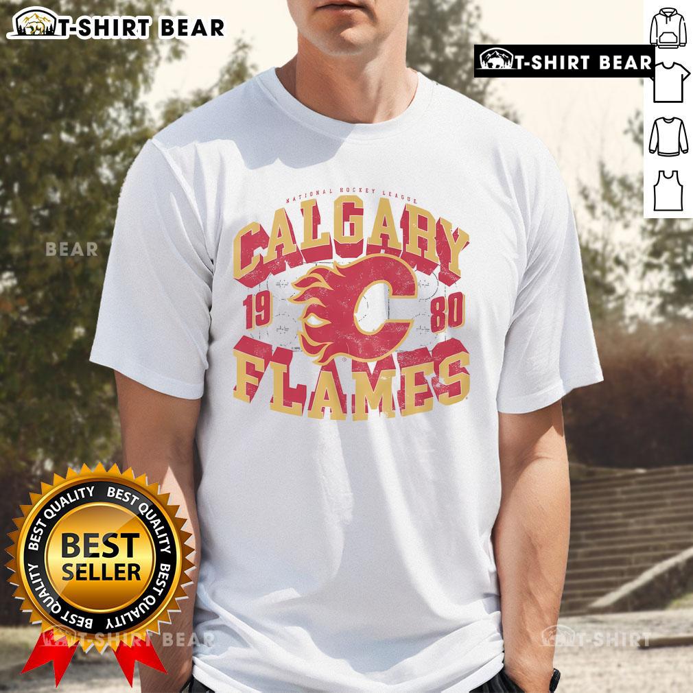 Alt Text: Top Calgary Flames Rink Arched Wordmark T-Shirt featuring bold team logo and vibrant colors for fans.