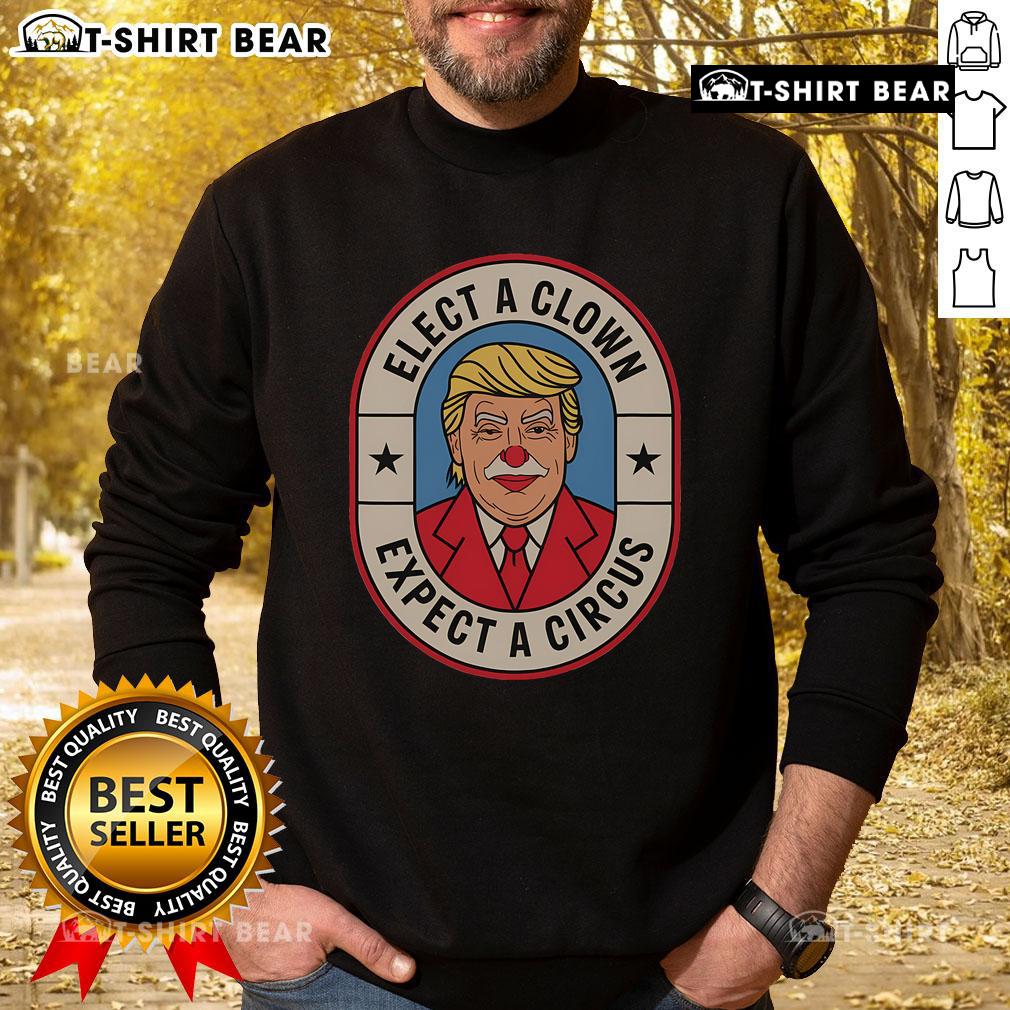 Anti-Trump sweatshirt featuring 'Top Elect A Clown, Expect A Circus' slogan, perfect for political protests and activism.