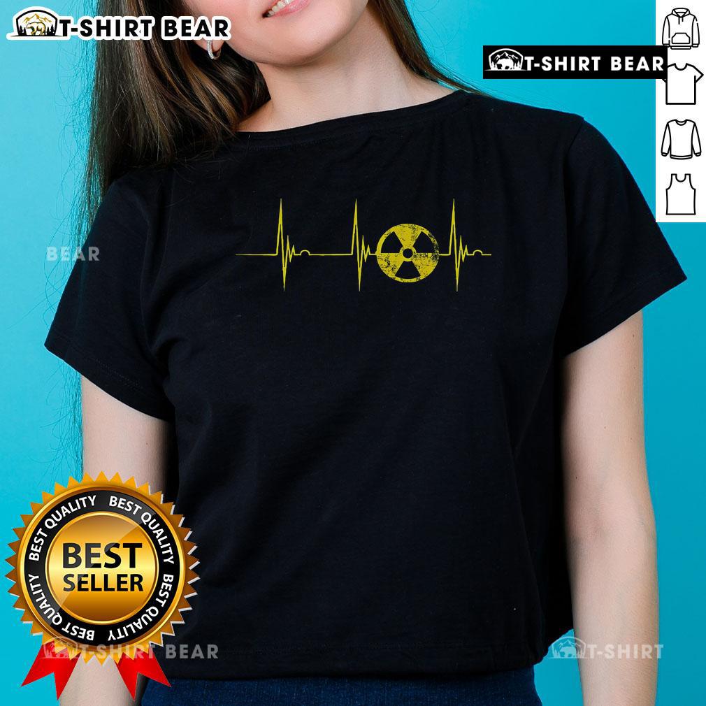 Alt Text: Ladies tee featuring a top heartbeat ECG pulse with a Fallout symbol and nuclear radiation sign design.