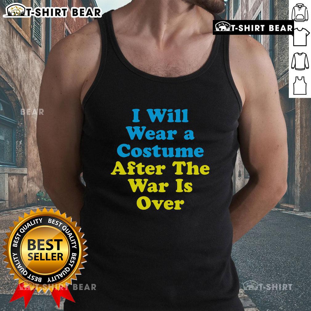 Alt Text: Woman wearing 'I Will Wear A Costume After The War Is Over' tank top, showcasing unique graphic design and casual style.