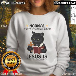 Black cat priest sweatshirt featuring the phrase Top Normal Isn't Coming Back, Jesus Is for stylish, unique apparel.